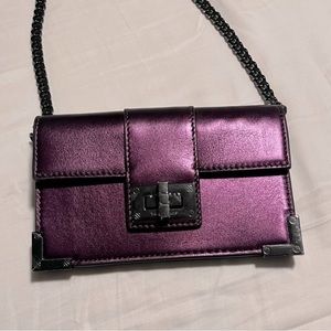 Metallic purple The Kooples crossbody wallet.
